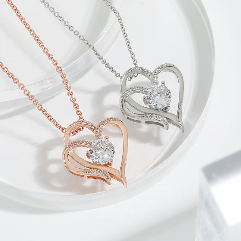 Collier Clavicule Double Cœur en Zircon Brillant – Bijou Élégant et Romantique pour Femme