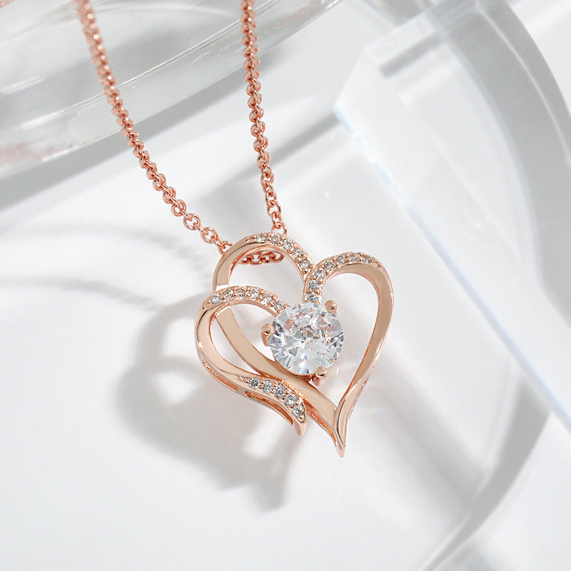 Collier Clavicule Double Cœur en Zircon Brillant – Bijou Élégant et Romantique pour Femme