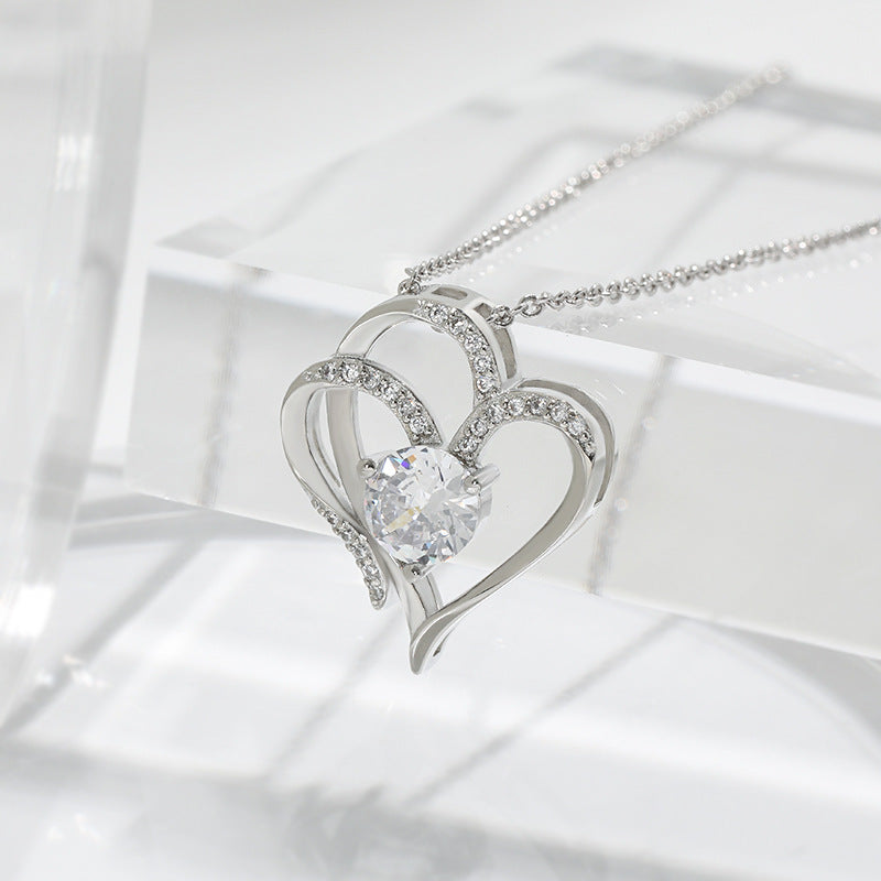 Collier Clavicule Double Cœur en Zircon Brillant – Bijou Élégant et Romantique pour Femme